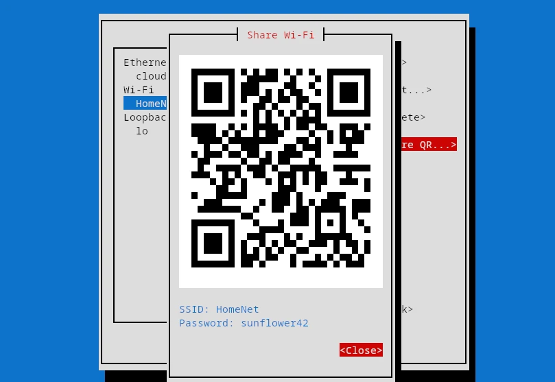 The Share Wi-Fi dialog in nmtui showing a QR code with the network name and password